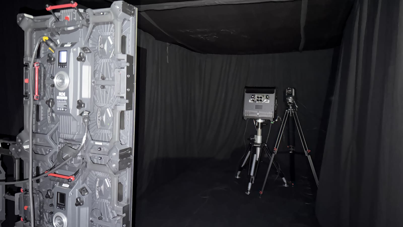 Brompton Hydra measurement system aligned on an LED panel in a dark studio